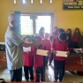 Peduli Pendidikan, Pemdes Tanjung Agung Beri Bantuan Beasiswa Bagi Pelajar Berprestasi